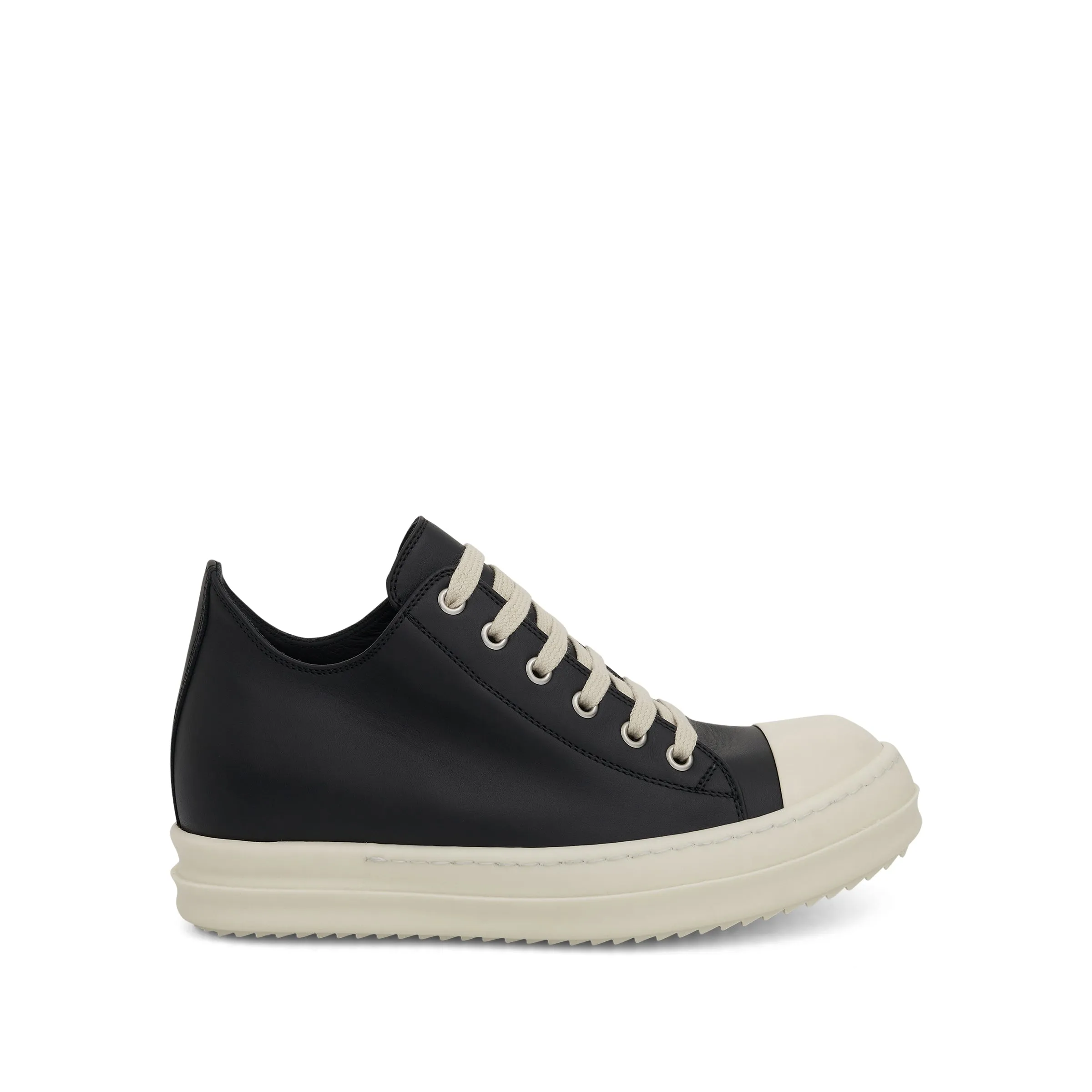 Low Leather Sneakers in Black/Milk sold by MARAIS