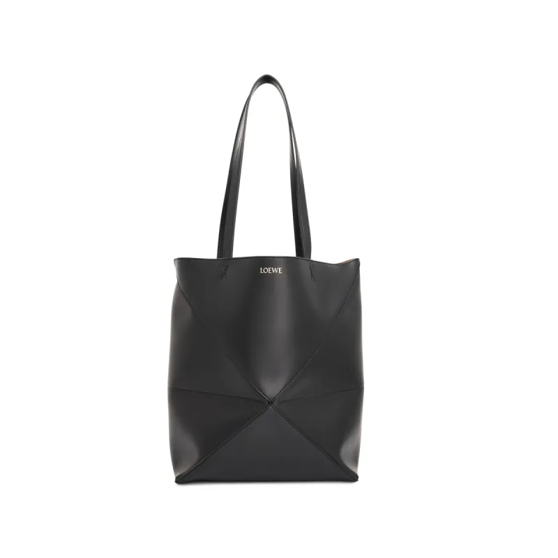 Medium Puzzle Fold Tote Bag in Black sold by MARAIS