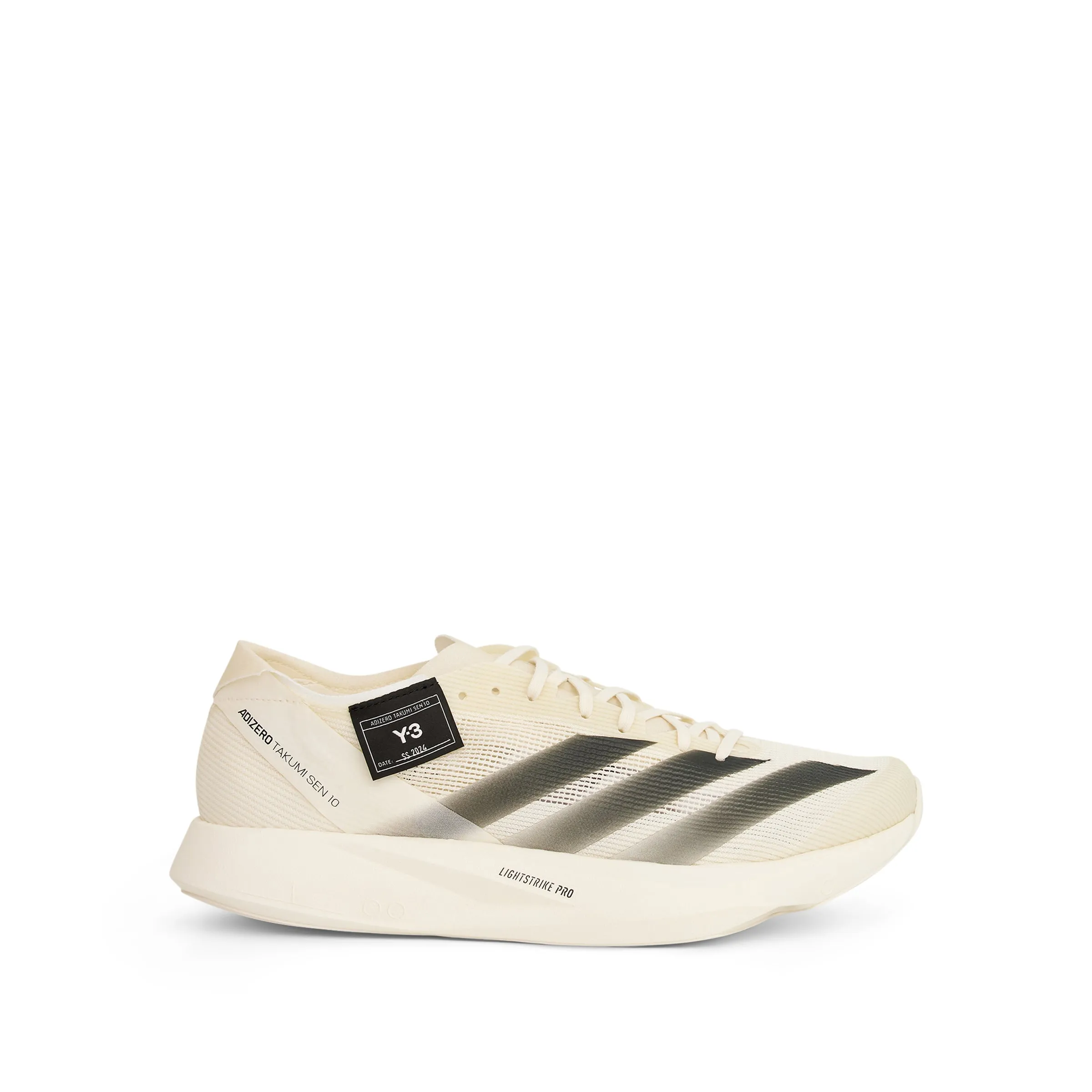 Takumi Sen 10 Sneaker in Off White/Black sold by MARAIS