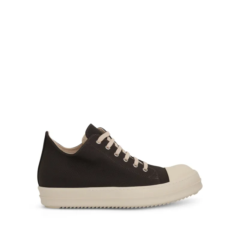 DRKSHDW Low Denim Sneakers in Dark Dust/Milk sold by MARAIS