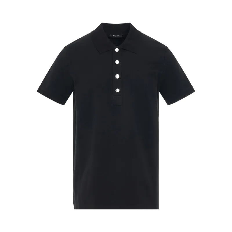 Monogram Cotton Pique Polo in Black sold by MARAIS
