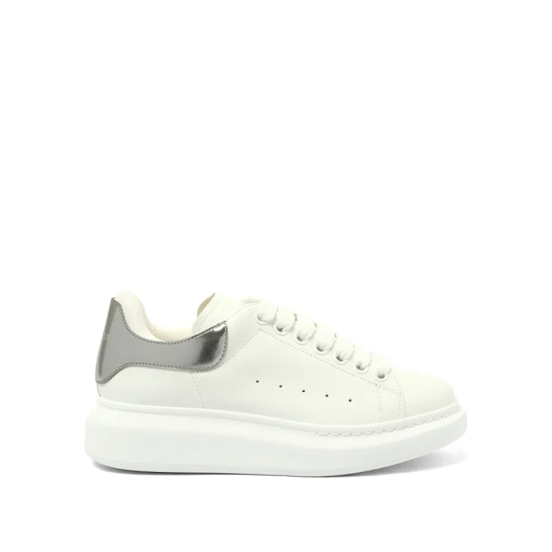 Larry Oversized Heel Sneaker in White/Silver sold by MARAIS