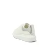 Larry Oversized Heel Sneaker in White/Silver sold by MARAIS