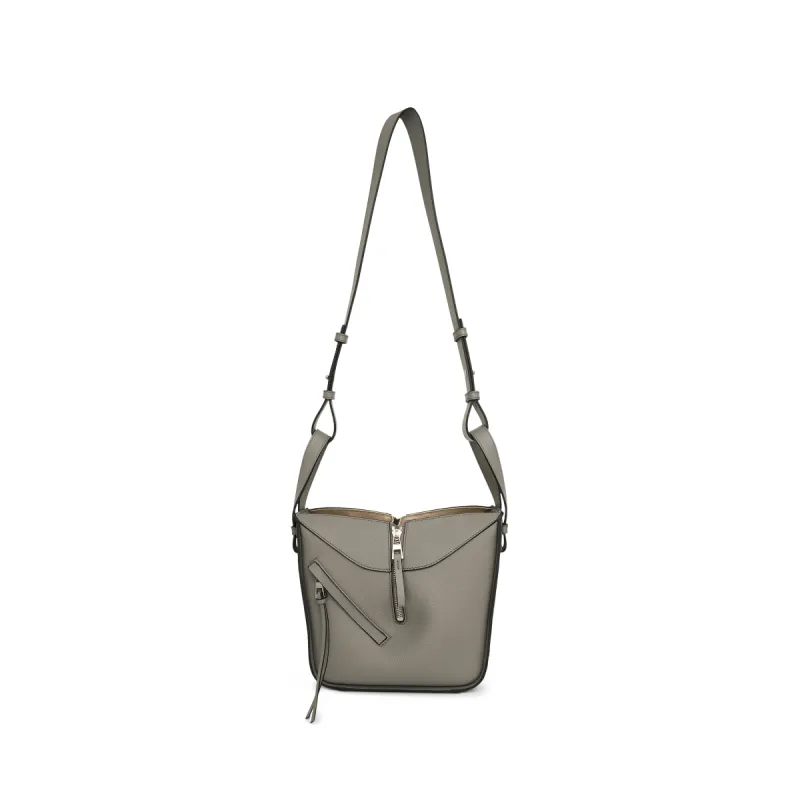 Compact Hammock Bag in Soft Grained Calfskin in Pearl Grey sold by MARAIS