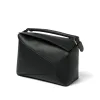 Puzzle Edge Bag in Black sold by MARAIS