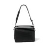 Puzzle Edge Bag in Black sold by MARAIS