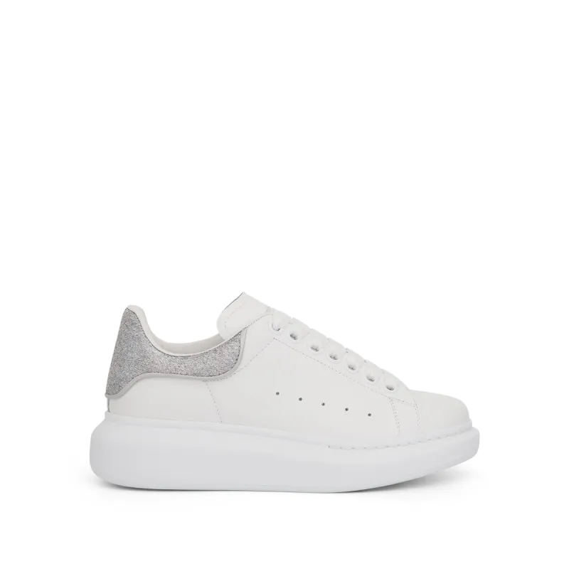 Larry Oversized Glitter Heel Sneaker in White/Grey sold by MARAIS