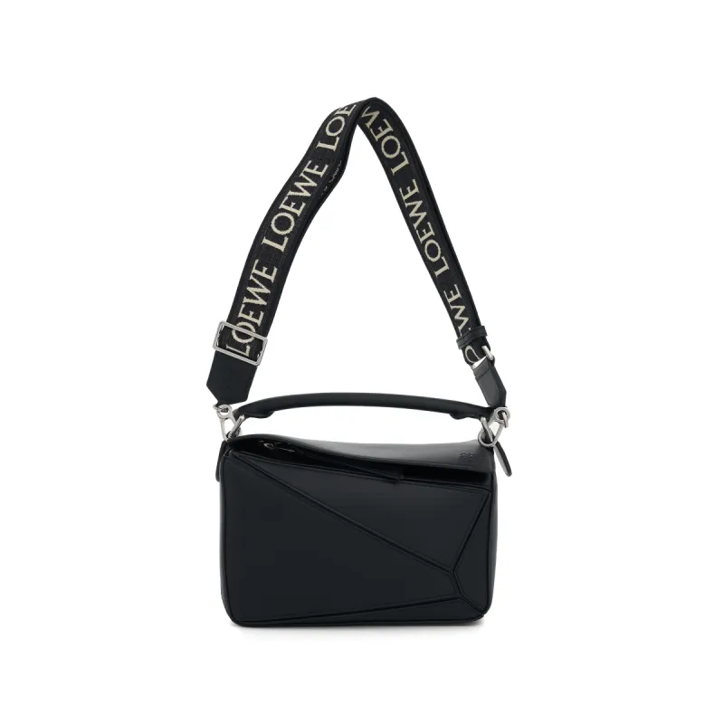 Small Puzzle Bag in Satin Calf in Black sold by MARAIS