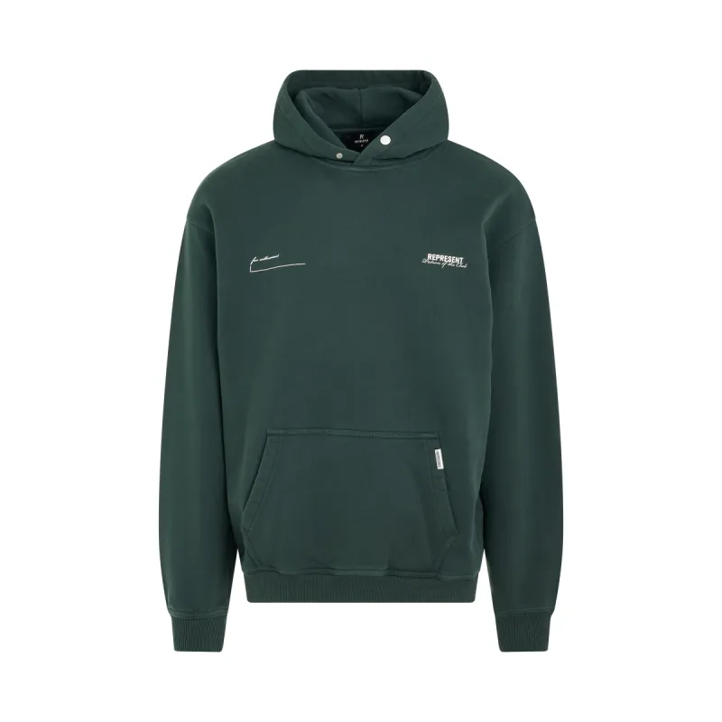 Patron of the Club Hoodie in Forest Green sold by MARAIS