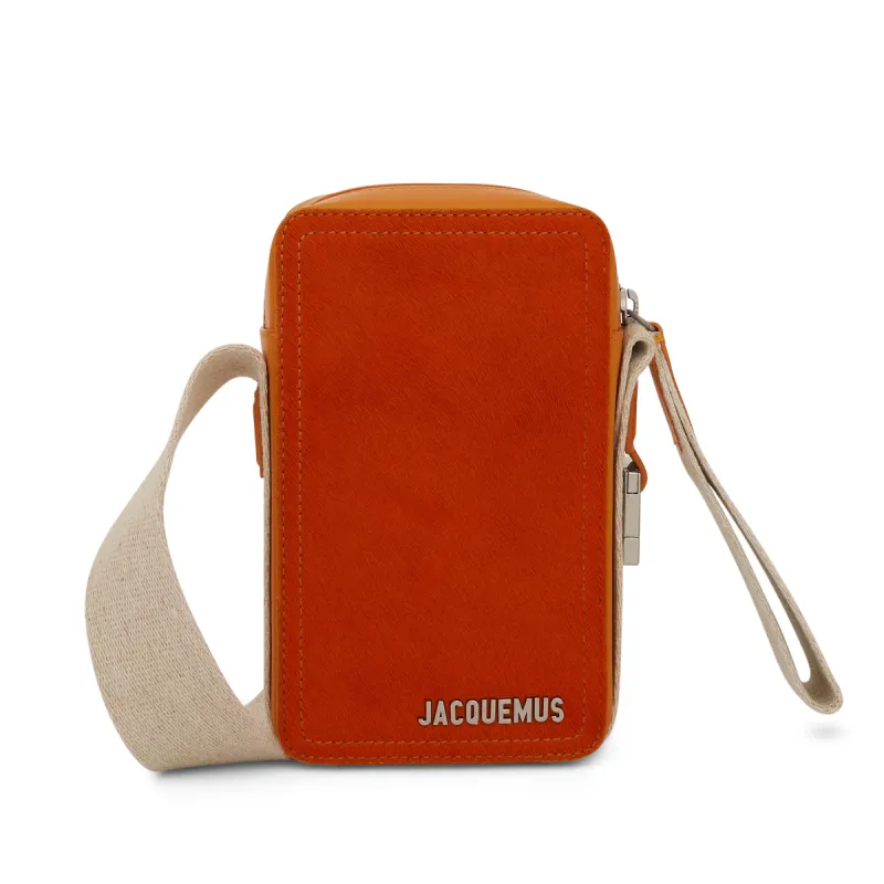Le Cuerda Vertical Leather Bag in Orange sold by MARAIS