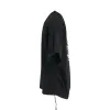 Tuck Oversized T-Shirt in Black sold by MARAIS