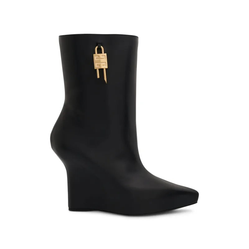 G Lock Wedge Low Box Leather Boots in Black sold by MARAIS