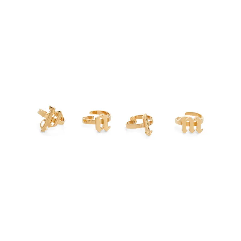 Gothic Palm Rings Set in Gold sold by MARAIS