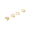 Gothic Palm Rings Set in Gold sold by MARAIS
