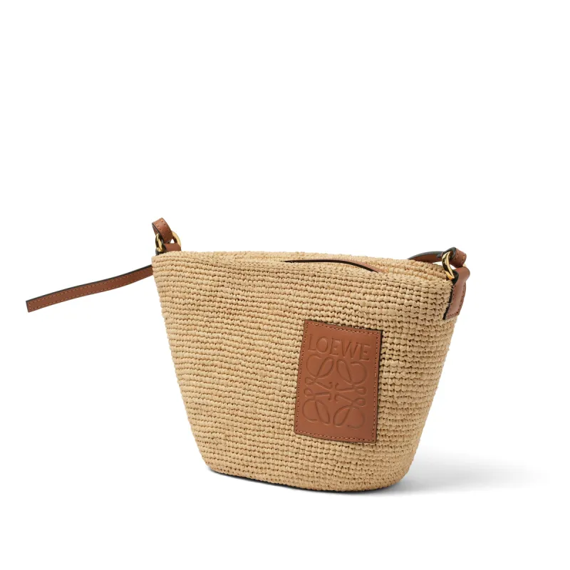 Slit Pochette Bag in Natural/Tan sold by MARAIS