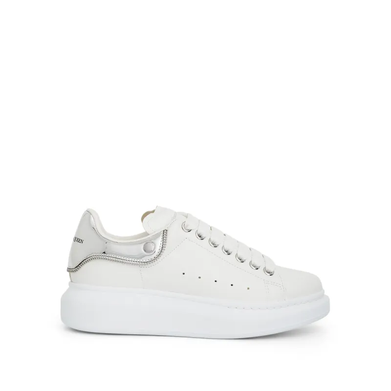 Larry Oversized Mirror Sneaker in White/Silver sold by MARAIS