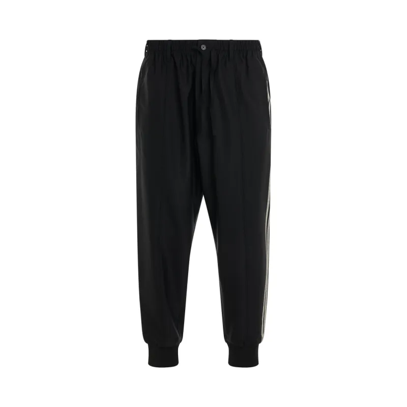 3 Stripes Refined Wool Cuffed Pants in Black sold by MARAIS