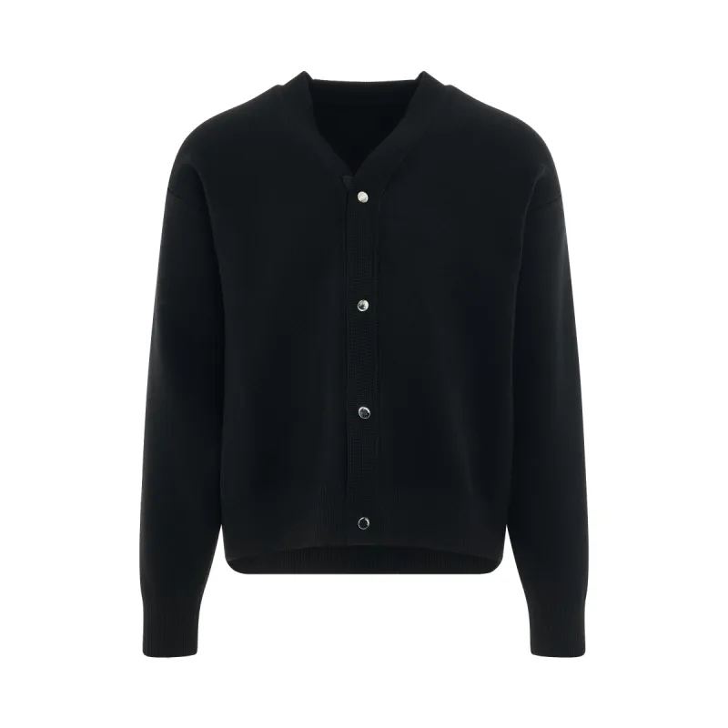 Boutonne Cardigan in Black sold by MARAIS