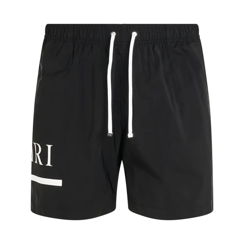 MA Bar Swim Trunk in Black sold by MARAIS