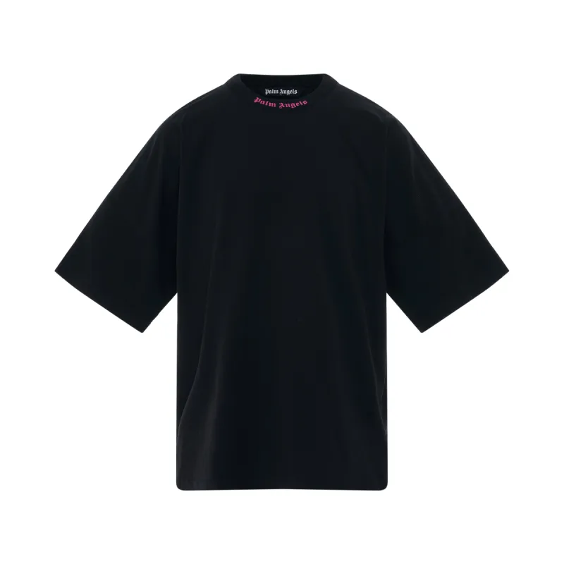 Doubled Logo Oversize T-Shirt in Black/Fuchsia sold by MARAIS
