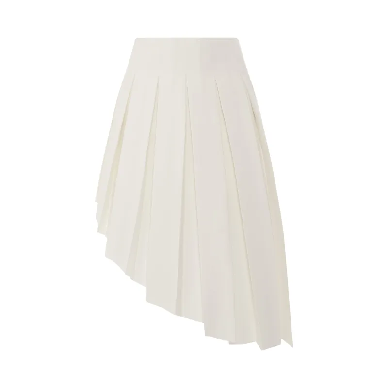 Wool Asymmetrical Pleated Skirt in White sold by MARAIS