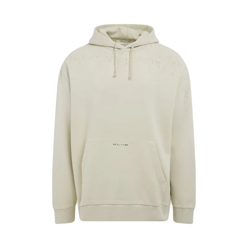 Printed Logo Treated Hoodie in Off White sold by MARAIS