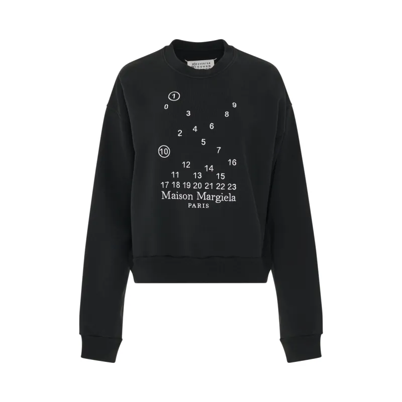 Scattered Numeric Logo Sweatshirt in Black sold by MARAIS