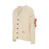 B12 Patch Oversized Knit Cardigan in Yew sold by MARAIS