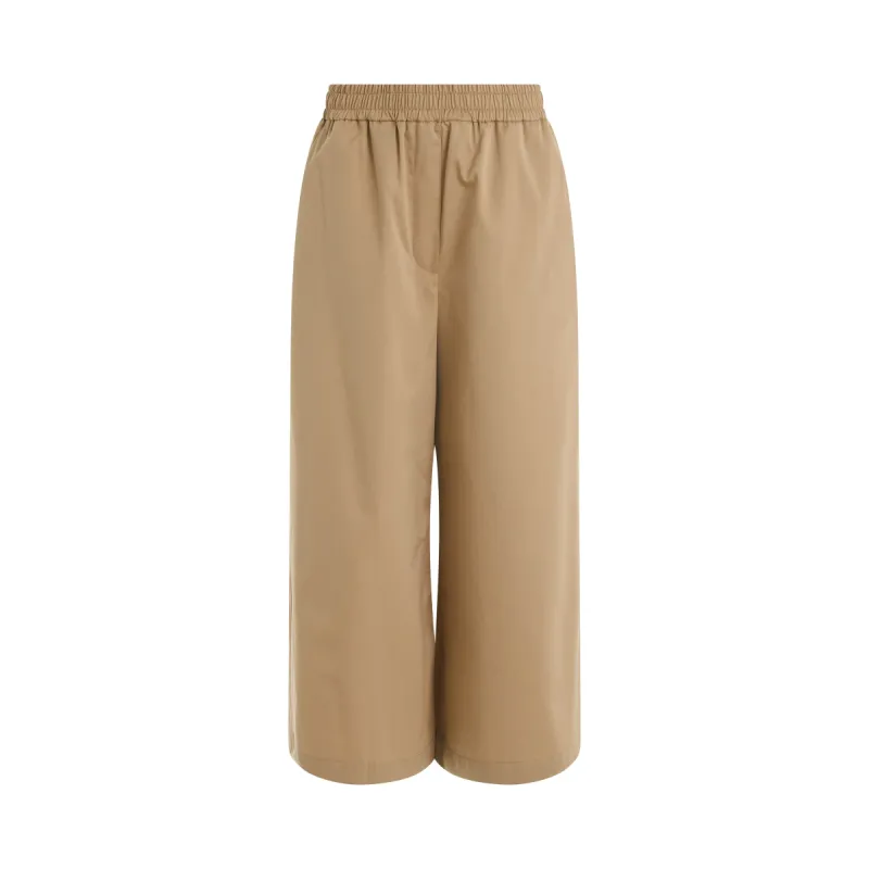 Cropped Trousers in Beige sold by MARAIS