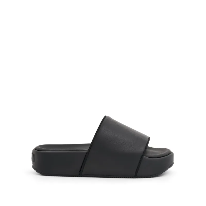 Y-3 Slides in Black sold by MARAIS