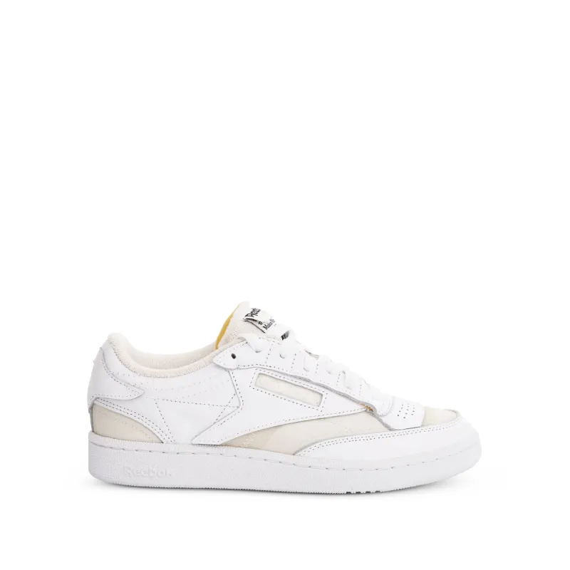 Maison Margiela x Reebok Sneaker in White/Orange sold by MARAIS