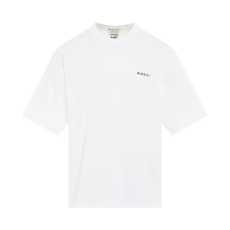 Embroidered Logo Relaxed Fit T-Shirt in Lily White sold by MARAIS