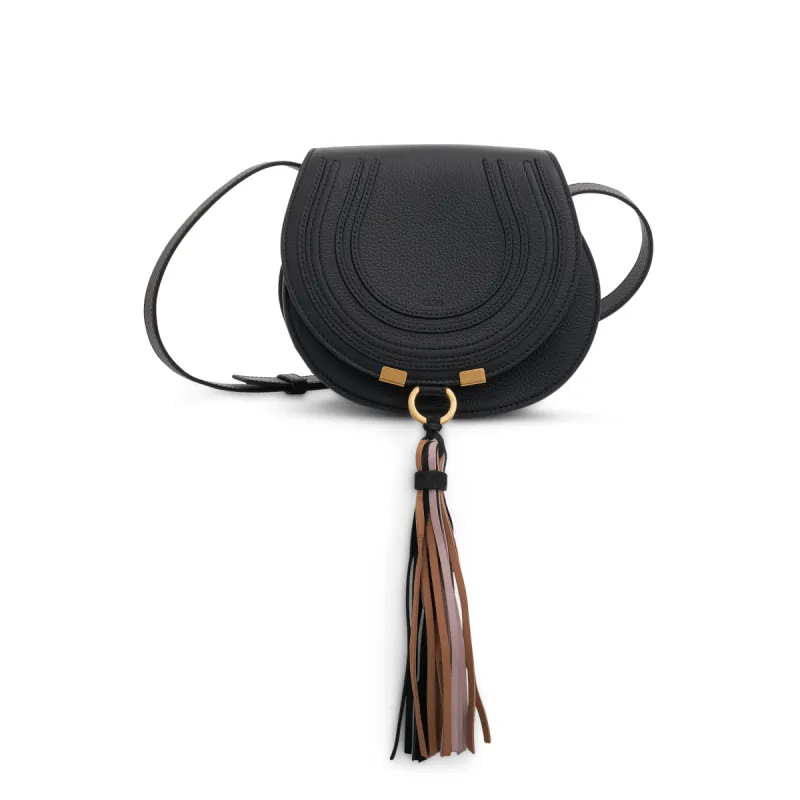 Small Marcie Saddle Bag with Suede & Nappa Tassel in Black sold by MARAIS