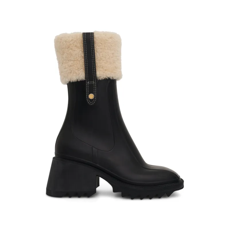Betty Ankle Rain Boot in Black sold by MARAIS