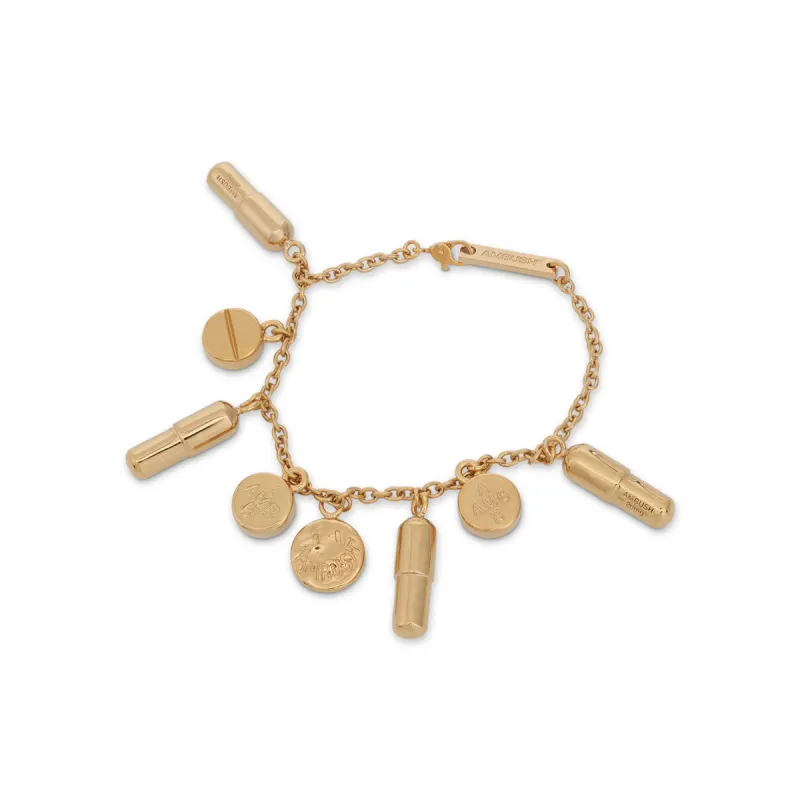 Multi Pill Charm Bracelet in Gold sold by MARAIS