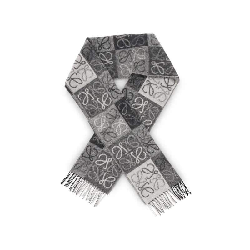 Anagram Wool Scarf in Black sold by MARAIS