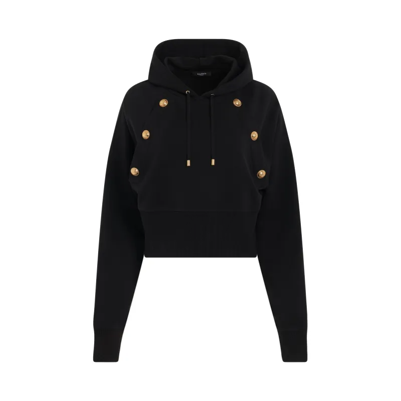 Buttonned Cropped Hoodie in Black sold by MARAIS