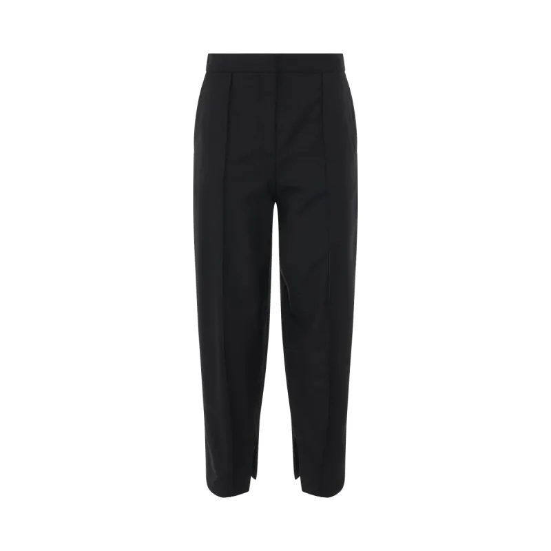Balloon Wool Trousers in Black sold by MARAIS