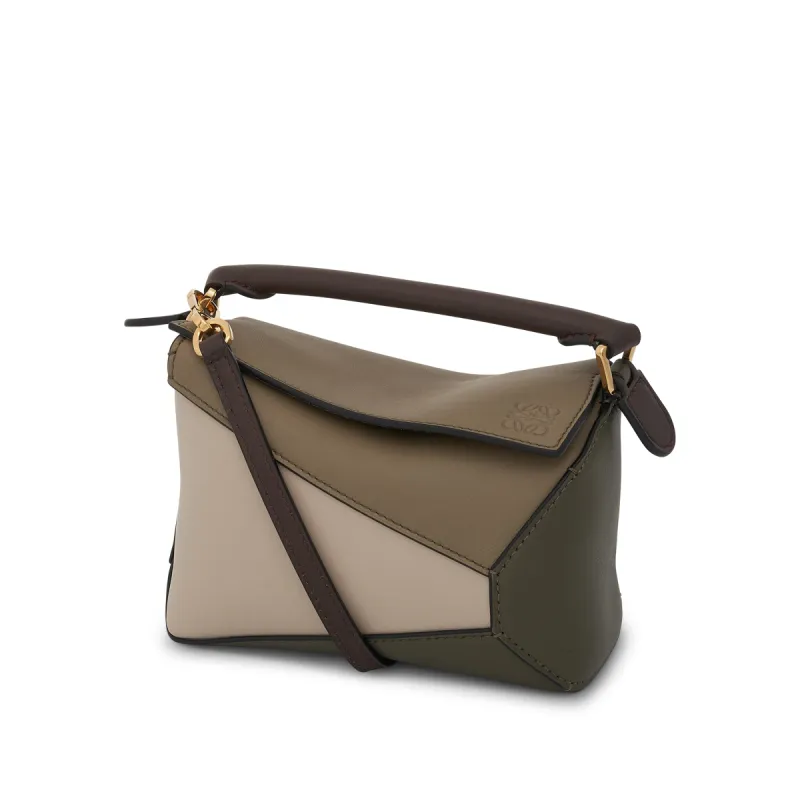 Mini Puzzle Edge in Nappa Calfskin in Laurel Green sold by MARAIS