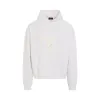 New Teddy Logo Pigment Hoodie in Ivory sold by MARAIS