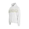 Tape Logo Ripped Pocket Hoodie in White sold by MARAIS