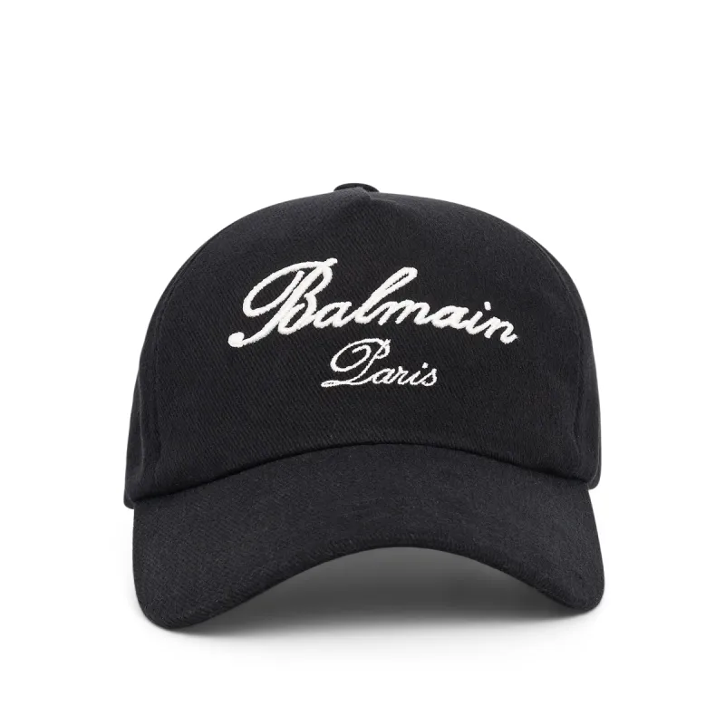Balmain Signature Cotton Cap in Black/Ivory sold by MARAIS