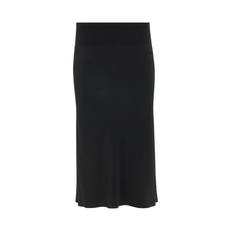 Woven Knee Bias Skirt in Black sold by MARAIS
