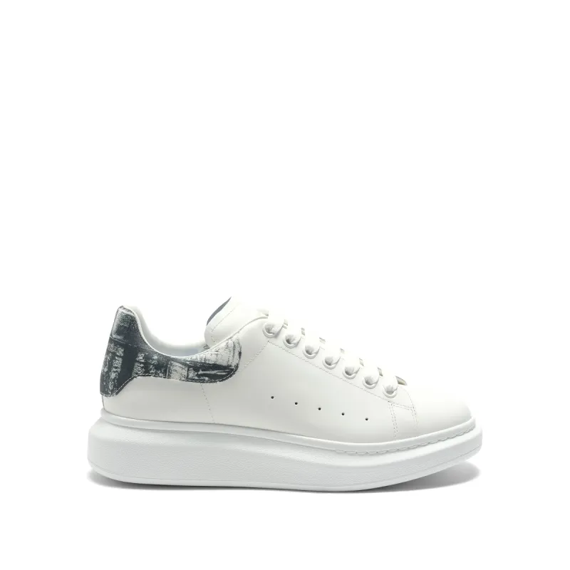 Larry Oversized Suede Heel Sneaker in White/Black made by MARAIS