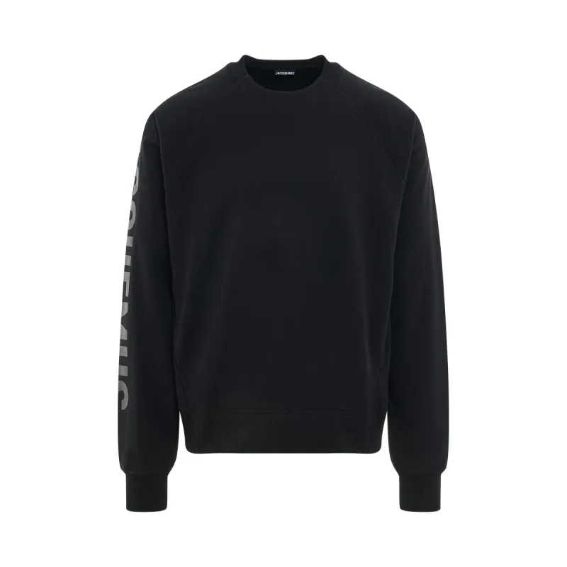 Typo Sleeve Logo Sweatshirt in Black made by Jacquemus