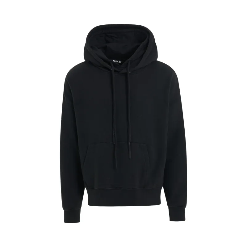 Patched Stars Vintage Hoodie in Black/White sold by MARAIS