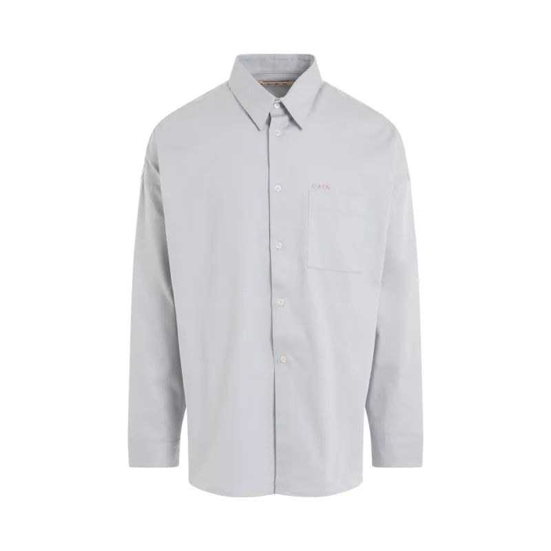 Chain Embroidery Logo Cotton Shirt in Ice sold by MARAIS