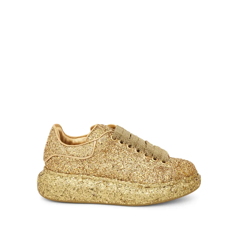 Larry Oversized Heel Glitter Sneaker in Gold sold by MARAIS