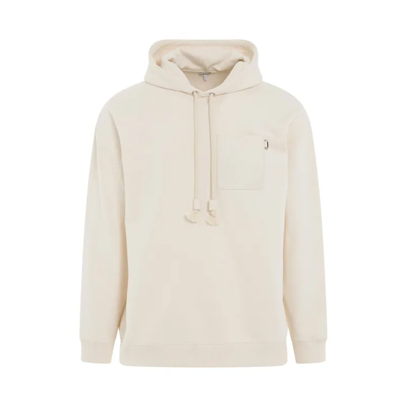 Anagram Patch Pocket Hoodie in White Ash sold by MARAIS