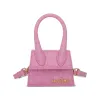 Le Chiquito Moyen Croc Embossed Leather Bag in Pink sold by MARAIS